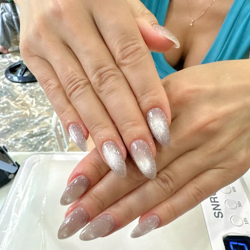 Silver glitter ombre nails by LENA Nails & Beauty, nail salon in Da Nang