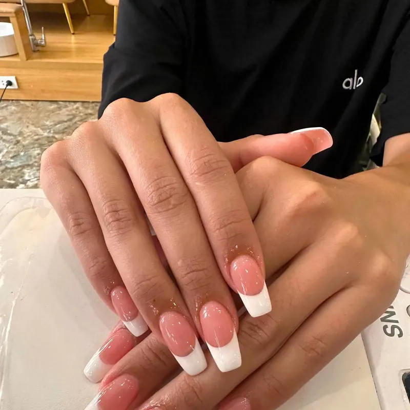 Pink and white French ombre nails by LENA Nails & Beauty, nail salon in Da Nang