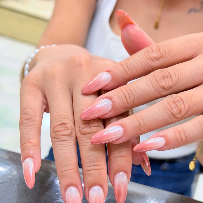 Pink and white ombre almond nails by LENA Nails & Beauty, nail salon in Da Nang