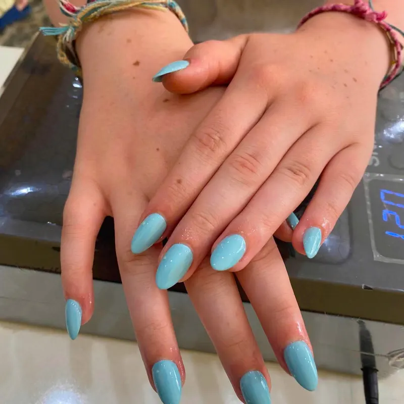 Turquoise blue almond nails by LENA Nails & Beauty, nail salon in Da Nang