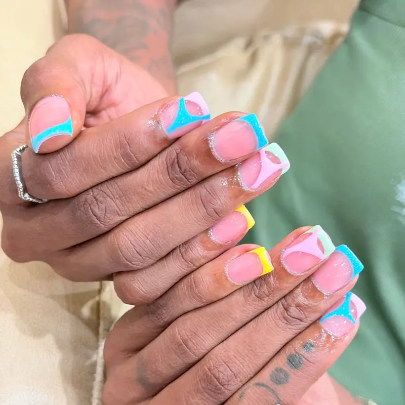 Pink and turquoise French tip nails by LENA Nails & Beauty, nail salon in Da Nang